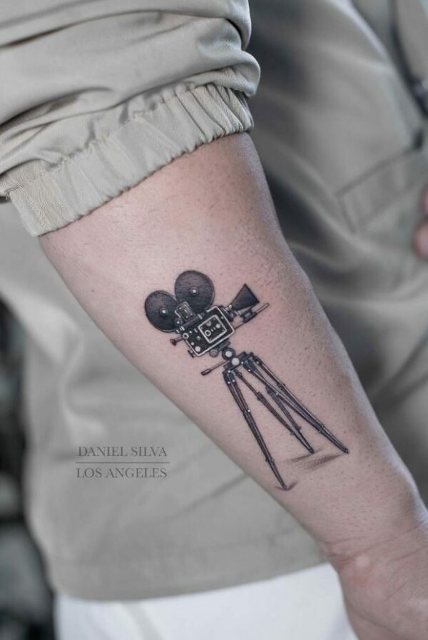 Tattoo of an old cinema camera Love the geometric influence  Tattoos  for guys Camera tattoos Movie tattoos